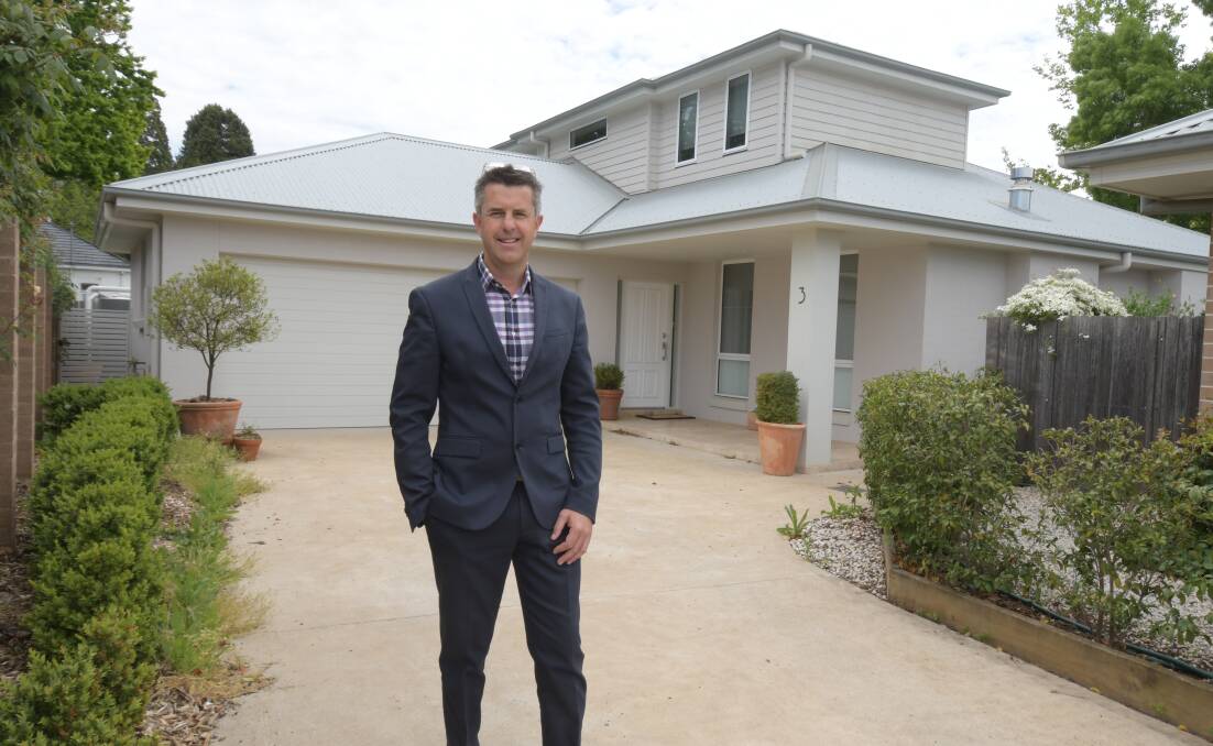 RECORD BREAKER: One Agency Orange director Ash Brown outside the villa in Kite Street which has just sold for more than $1 million. Photo: JUDE KEOGH