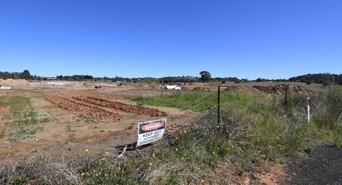 HOUSING PLAN: Crews work on the site of the proposed 12-lot estate (inset) at Shiralee this week. Photo: CARLA FREEDMAN