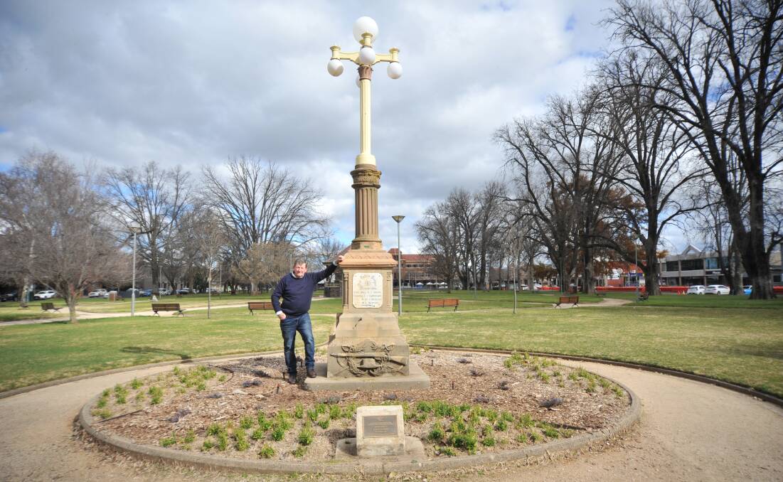 STAYING PUT: Orange mayor Cr Reg Kidd with the Boer War memorial in Robertson Park. Photo: CARLA FREEDMAN