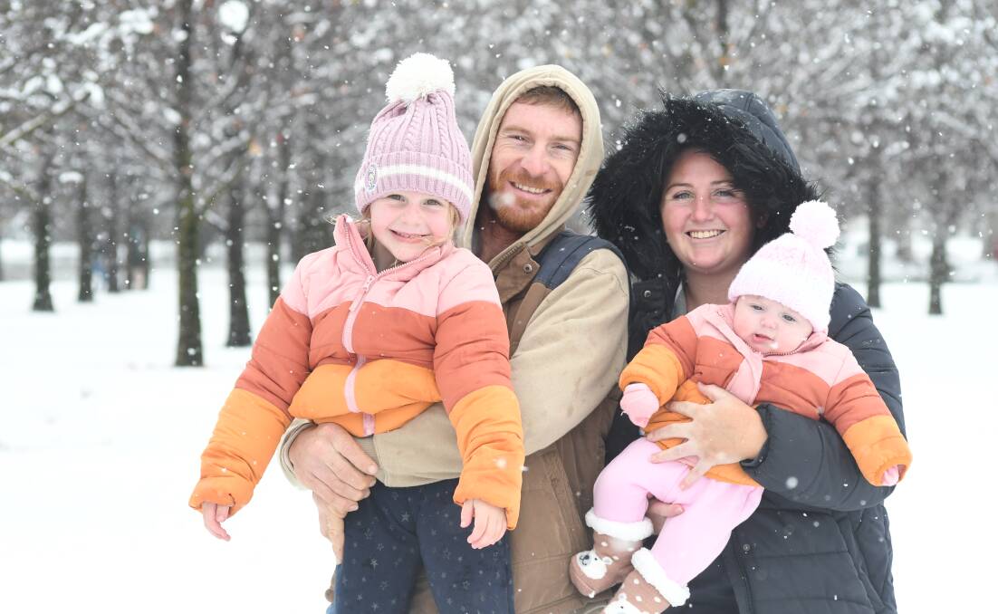 VISITORS: Addi, Nick, Molly and Florence Evison came from Wellington to play in the snow in Orange. Photo: JUDE KEOGH