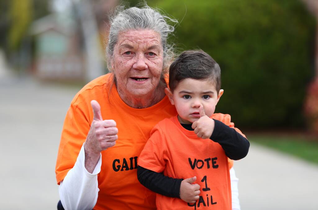 THUMBS UP: Gail Copping, with supporter Jenson Brown, is running a true grass roots campaign. Photo: PHIL BLATCH 0904pbgail3