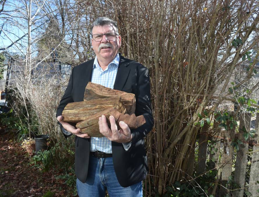 HELPING OUT: Cr Glenn Taylor has led the charge for a wood bank to help the needy in Orange.