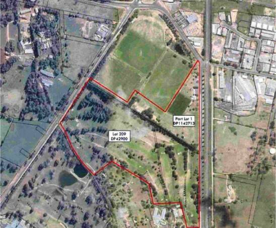 SITE: The sports precinct would take up part of the former golf course south of Jack Brabham Park show inside the red lines.