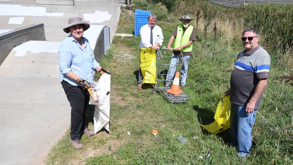 CLEANING UP: Rosemary Stapleton, Cr Kevin Duffy, Nick King and Cyril Smith prepare for Sunday's activity. Photo: JUDE KEOGH