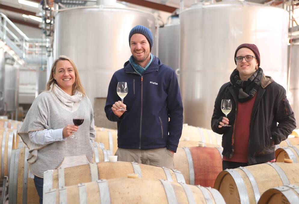 WINE: Chrissy Robson with winemakers Luke Steele and Daniel Sanders. Photo: CARLA FREEDMAN
