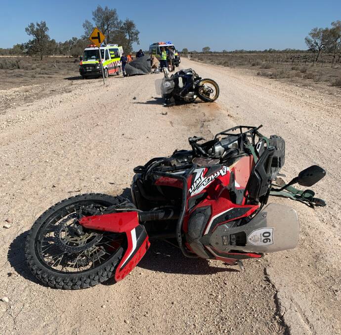 CRASH SCENE: The motorbikes on the dirt road after the crash. Photo: Supplied, NSW Ambulance