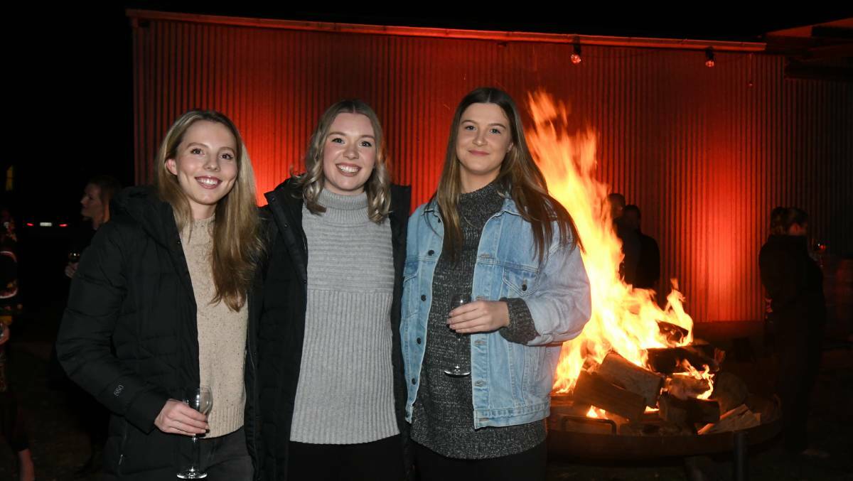 BONFIRE NIGHT: Ellen Sainty, Jordyn Casey, Cassidy Batiste enjoyed the Winter Fire Festival. Photo: CARLA FREEDMAN 0804cfdesalis3