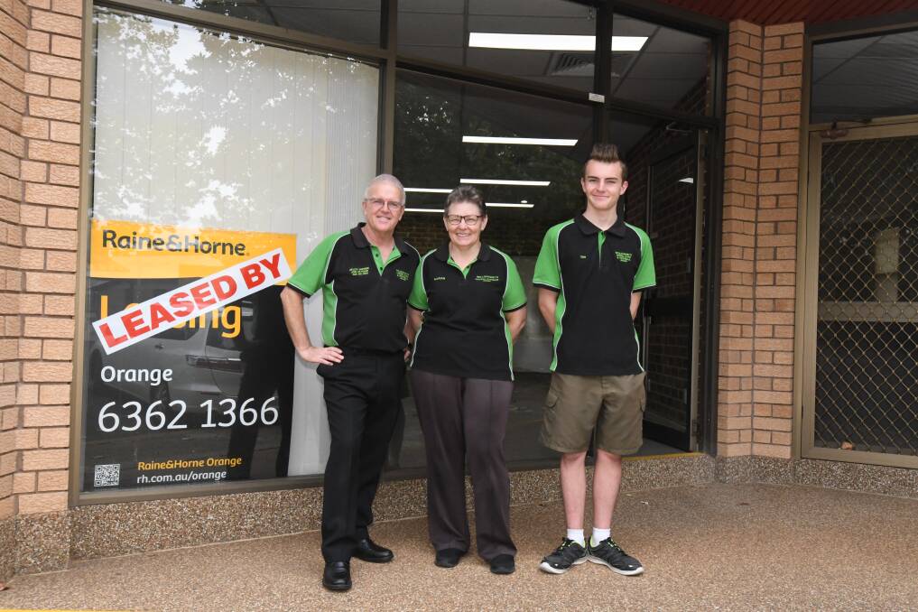 NEW HOME: Paul, Marian and Tim Willoughby outside their new shop in Lords Place. Photo: CARLA FREEDMAN