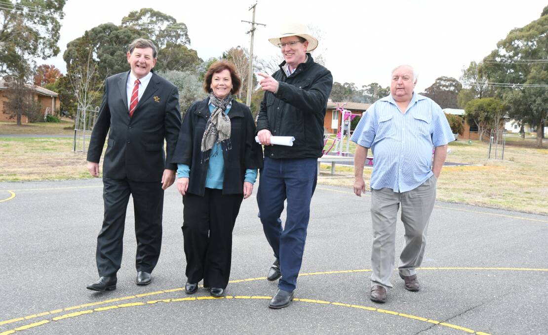 SAFER LIVING: Mayor Reg Kidd, Bowen Community Technology Centre co-ordinator Paula Townsend, Member for Calare Andrew Gee and the chairman of the Bowen Residents Action Group Ron Gander. Photo: JUDE KEOGH 0614jkfunding3