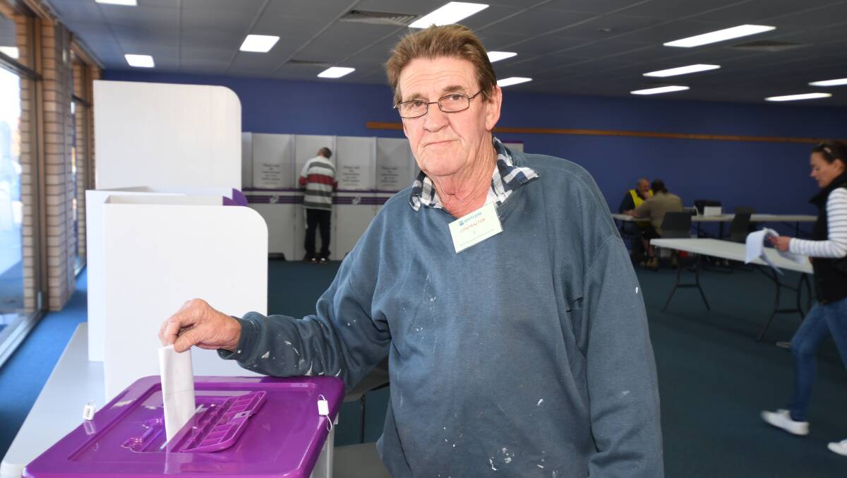 VOTING: Robert Job cast his vote on Monday morning. Photo: CARLA FREEDMAN 0429cfprepoll1