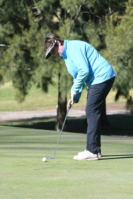 ACTIVE: Julie Roweth plays at the Wentworth golf course on Wednesday.