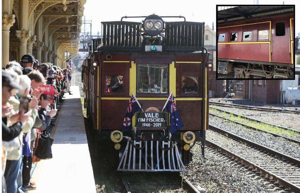 PAST EVENTS: Mourners watch the funeral train in southern NSW in 2019 while (inset) vandals smashed the train windows when it was parked in Orange last year.