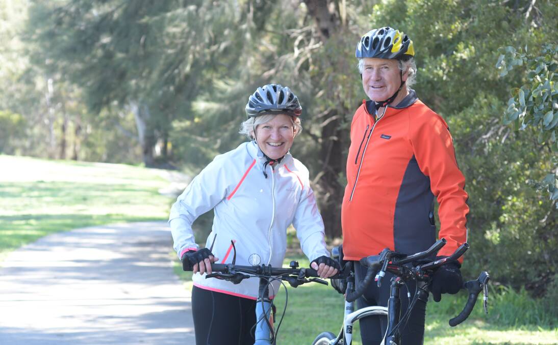 WARY: Orange cyclists Glenda and Noel McKay. Photo: JUDE KEOGH