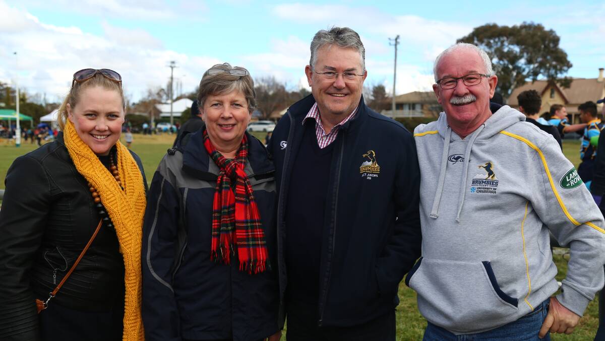 BIG SPENDERS: Emma, Susan and Martin Sullivan with Greg Wenham from Canberra who visited Orange for the junior rugby event. Photo: PHIL BLATCH 0611pbru5