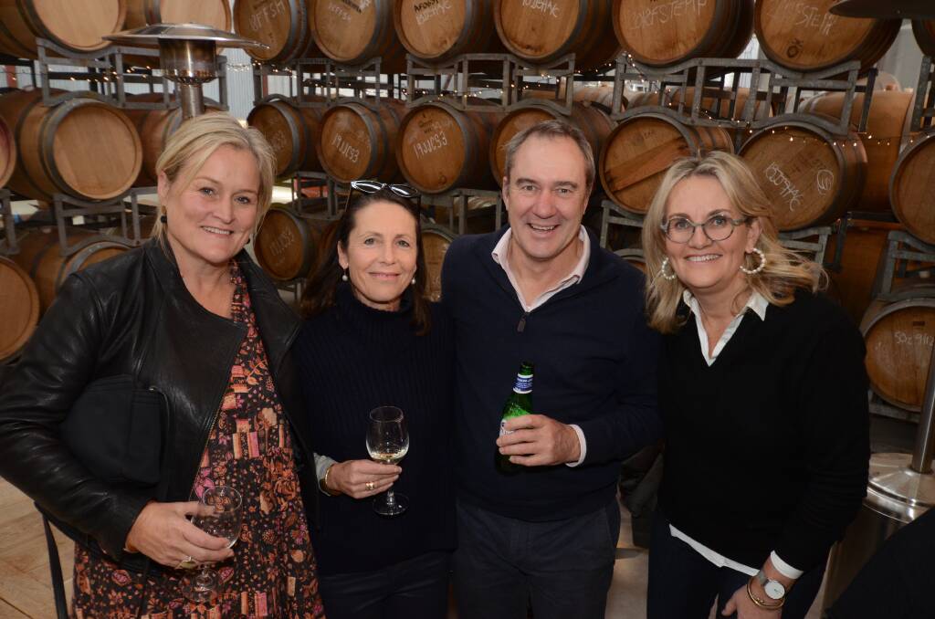 OUT AND ABOUT: Liddy Pattinson and Sarah MacSmith with Will and Dibs Crowley at Ross Hill Wines on Saturday. Photo: JUDE KEOGH