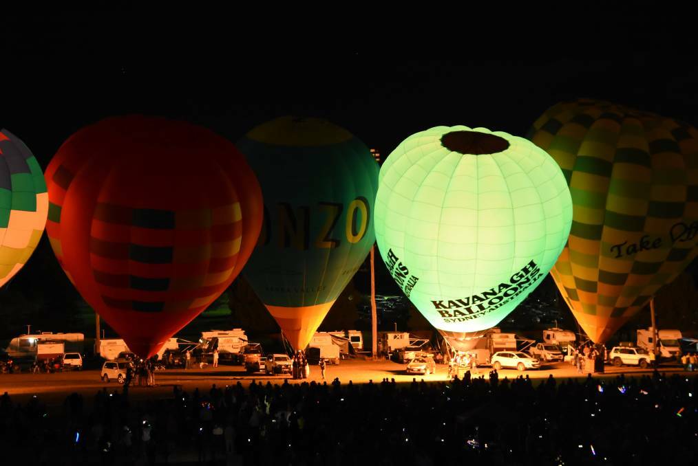 GLOWING: The Canowindra balloon festival's key event attracted a big crowd. 