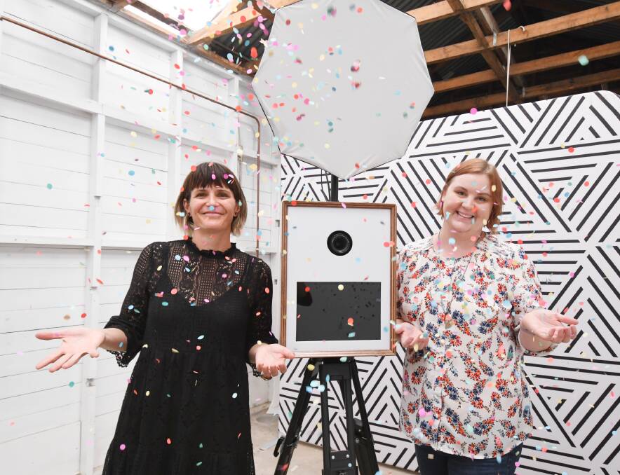 COLOURFUL FUN: Photographers Kirsten Cunningham and Penny Rohleder. Photo: JUDE KEOGH
