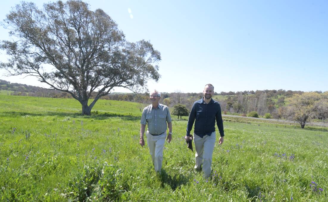 SHINING SUPPORT: Co-operative board members David Manning and Granton Smith on the planned solar park site at Orange. Photo: JUDE KEOGH