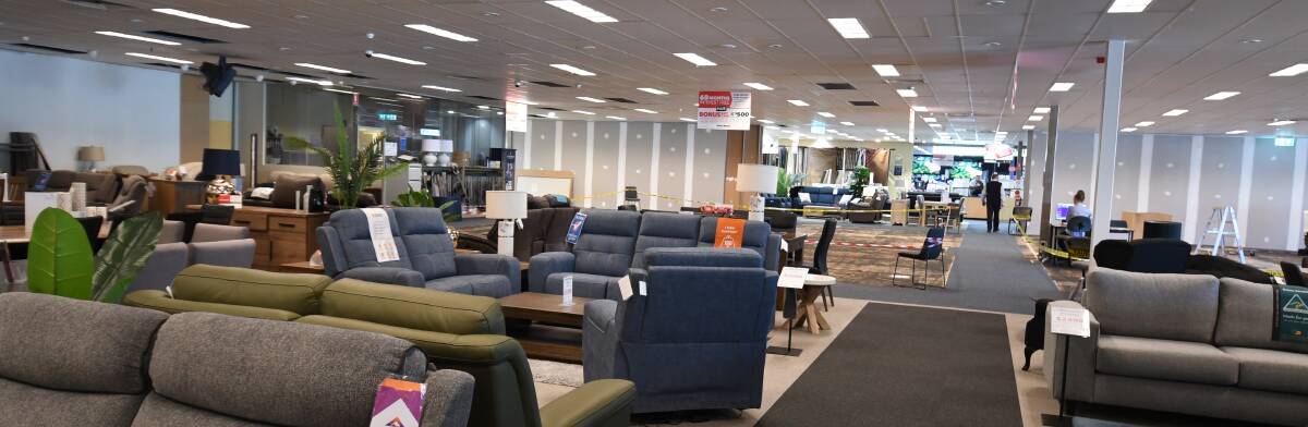 EXPANDING: Harvey Norman has taken over an adjacent site previously used by a furniture store with work due to be finished in a few months. Photo: JUDE KEOGH