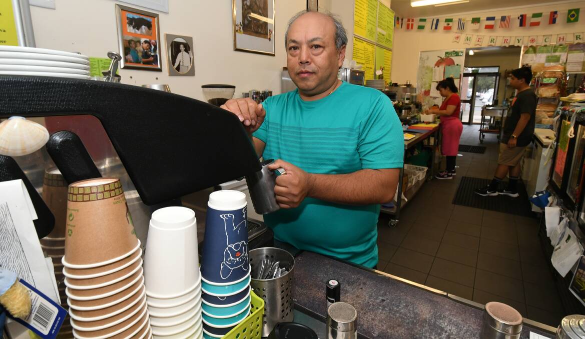 TOUGH TIMES: Orange cafe owner Rodney Soo says his Christmas trade is down following the closure of Myer in January this year. Photo: JUDE KEOGH 1512jkcheeky1