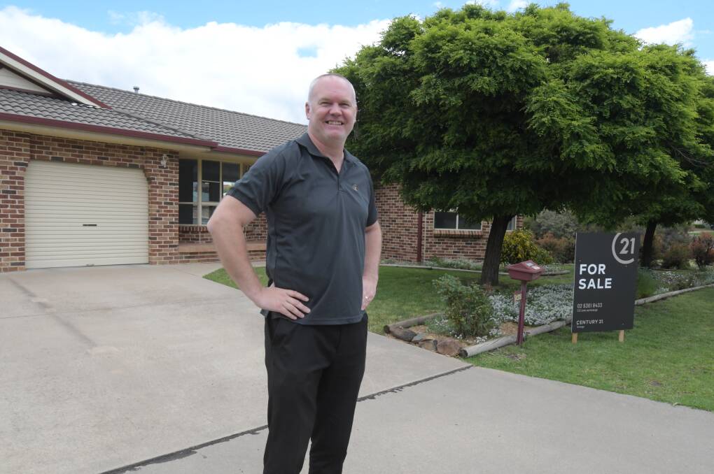 ON THE MONEY: Century 21 Combined Orange real estate director Andrew Vogler outside an Anson Street property for sale. Photo: JUDE KEOGH