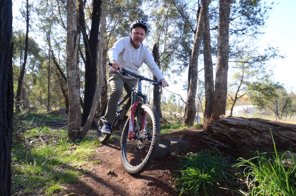 RIDING HIGH: Cr Jason Hamling is a keen mountain bike rider who is pushing for the Mount Canobolas trail park to be built for locals and visitors. Photo: JUDE KEOGH