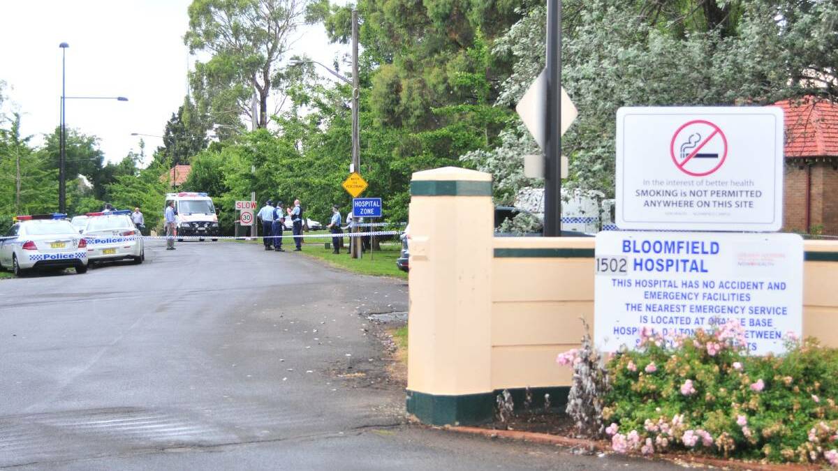 NOT FORGOTTEN: The scene outside Bloomfield Hospital in 2011 after two staff were stabbed by a patient.
