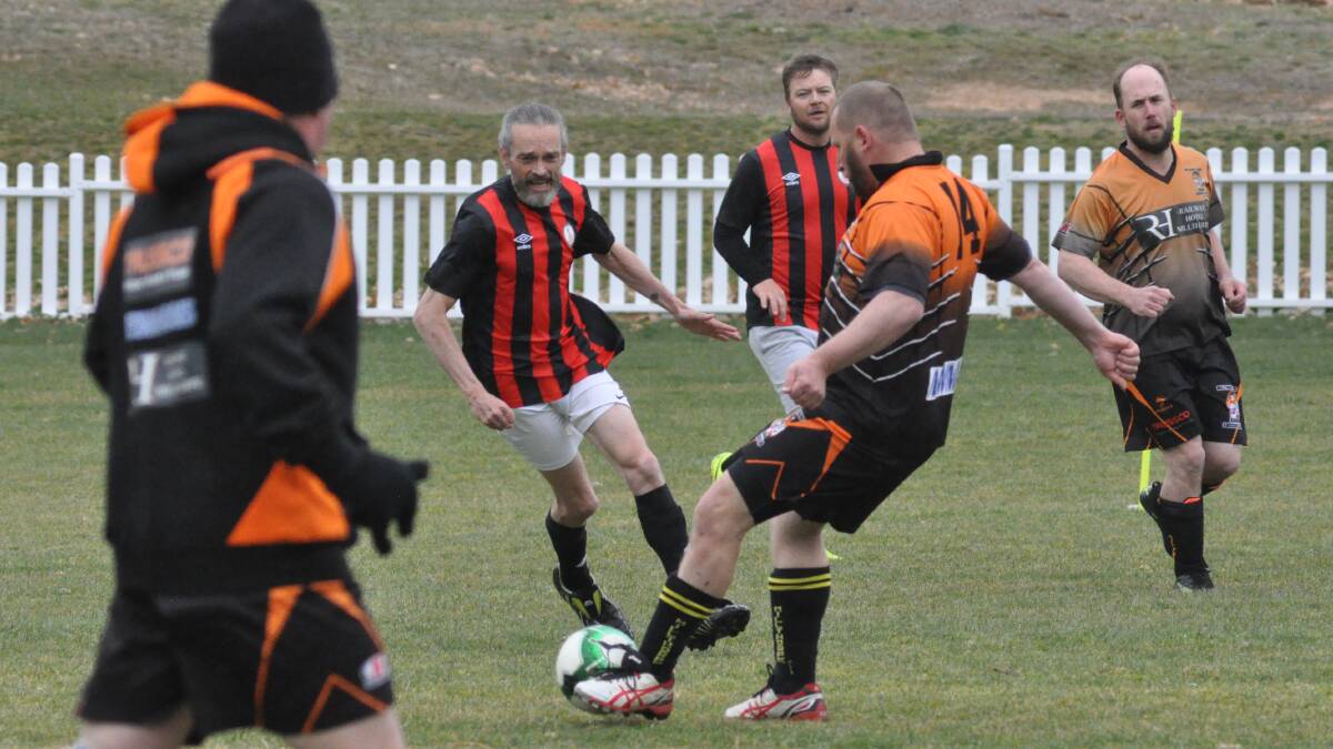 CHILLY: Denley Moore and Millthorpe in the Orange over 35s clash. Photo: Supplied