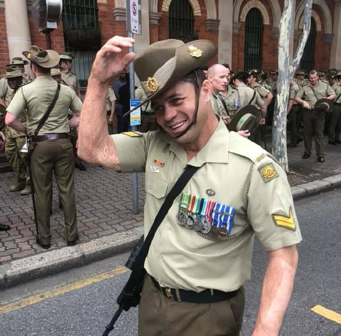 PERSONAL CALL: Corporal Ben Duffy participates in Anzac Day activities in Brisbane last year. Photo: Supplied