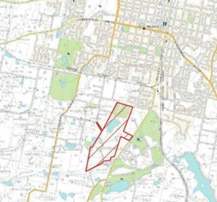 THE SPRINGS: A map, looking north, showing in red the size and location of the area studied for information about the camp. It is near the current Shiralee housing estate with Sir Jack Brabham Park and the Orange hospital to the right of the site. Photo: Supplied
