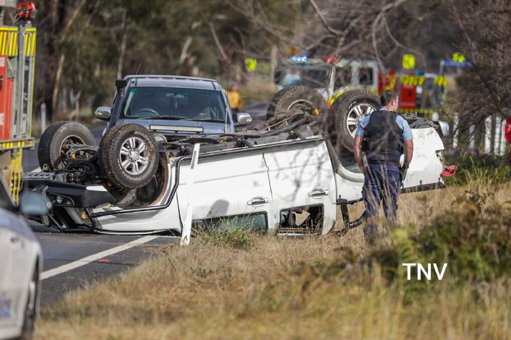 CRASH SCENE: Rollover accident on Cadia Road. Photo: TROY PEARSON/TNV