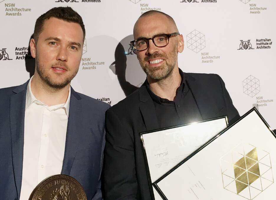 DELIGHTED: Orange Regional Museum architects Ashley Dennis and Niall Durney with their prizes at the NSW Architecture Awards on Saturday night. Photo: Supplied