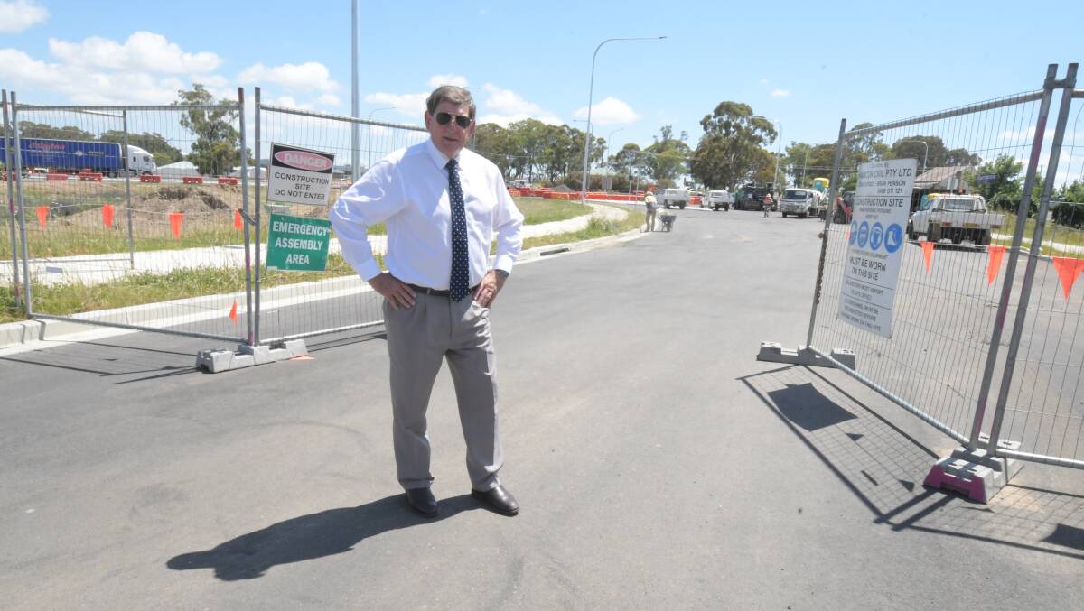 GETTING CLOSER: Orange mayor Cr Reg Kidd at the NDR roundabout worksite with work nearing completion. Photo: JUDE KEOGH