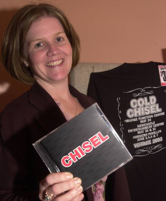 LAST TIME: In 2003 Bec Anderson was photographed with a Cold Chisel CD and the 2003 tour T-shirt with Orange Function Centre and date written on the back. Photo: OLIVIA SARGENT
