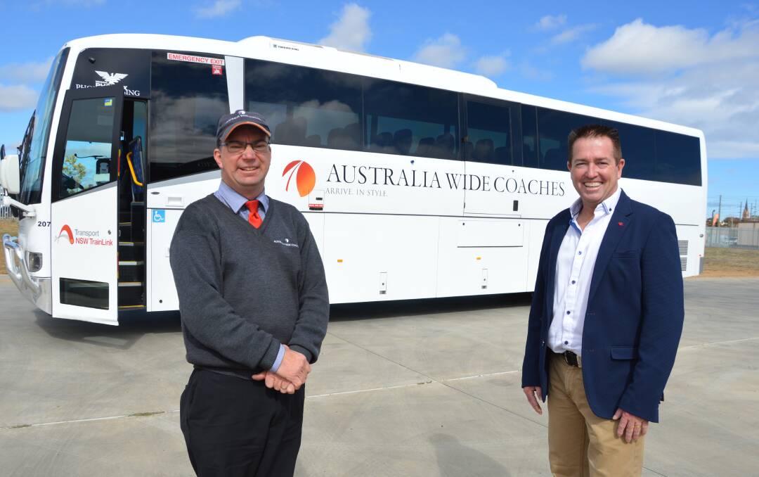 BUS DRIVER: Simon Smith with Regional Transport minister Paul Toole. Photo: Supplied.