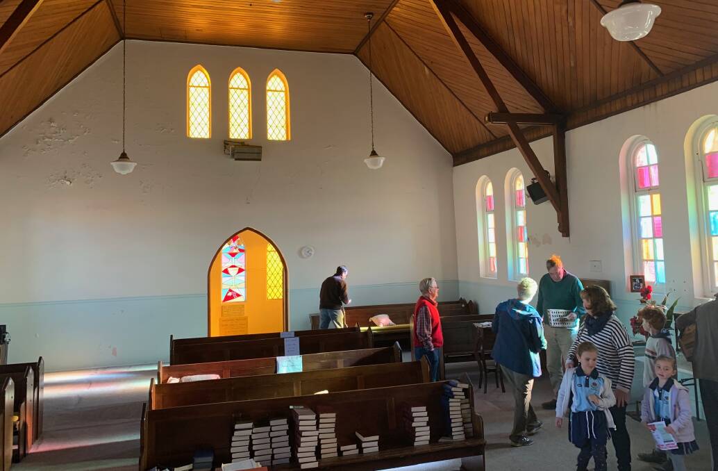 CLEANED OUT: Bargain hunters move in at the Five Ways Uniting Church. 