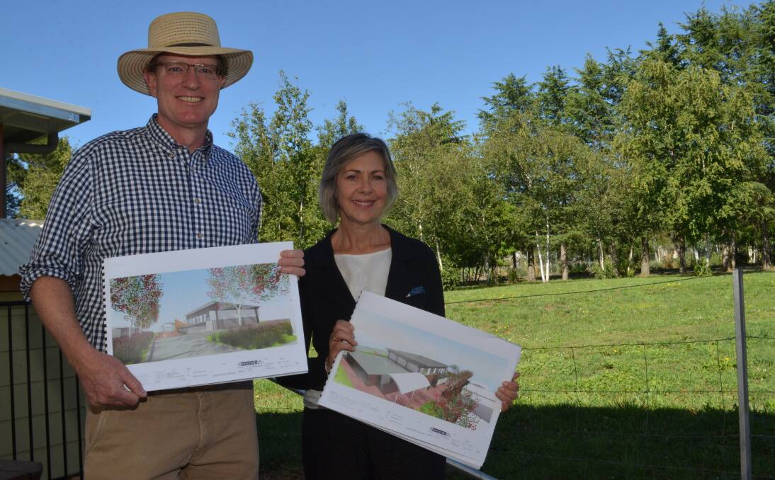 FINAL FUNDING: Member for Calare Andrew Gee and school principal Melissa Brown with plans for the new hall to be built on land behind them. Photo: DAVID FITZSIMONS