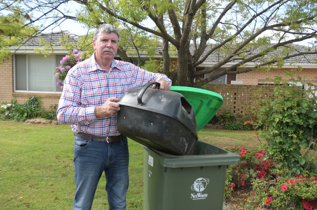 FILL 'ER UP: Cr Glenn Taylor says spring mowing has led to green bins being too heavy for garbage contractors to empty. Photo: CARLA FREEDMAN