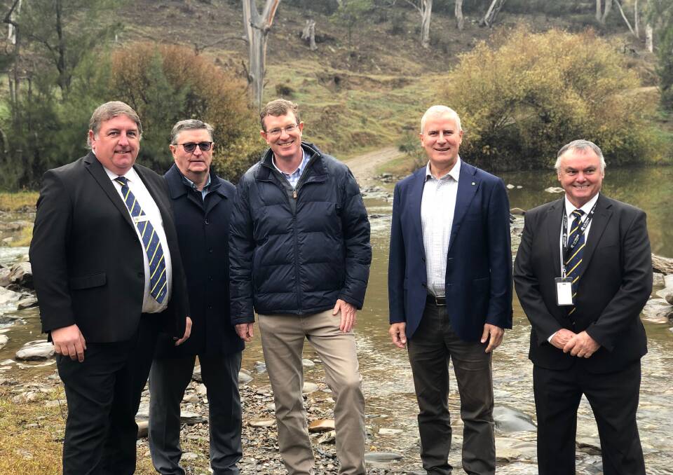 RIVER CROSSING: Deputy Mayor of Cabonne Cr Anthony Durkin, Mayor of Mid-Western Regional Council Cr Des Kennedy, Member for Calare Andrew Gee, Deputy Prime Minister Michael McCormack and Cabonne Council Director of Engineering and Technical Services Bob Cohen. Photo: Supplied