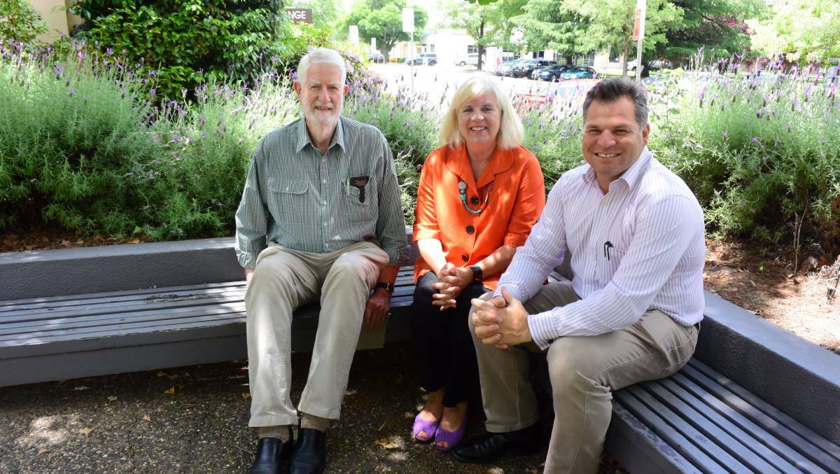 PROGRESS: Past Orange Health Council chairman Dr Richard Jane, Orange Push for Palliative's Jenny Hazelton and member for Orange Phil Donato.