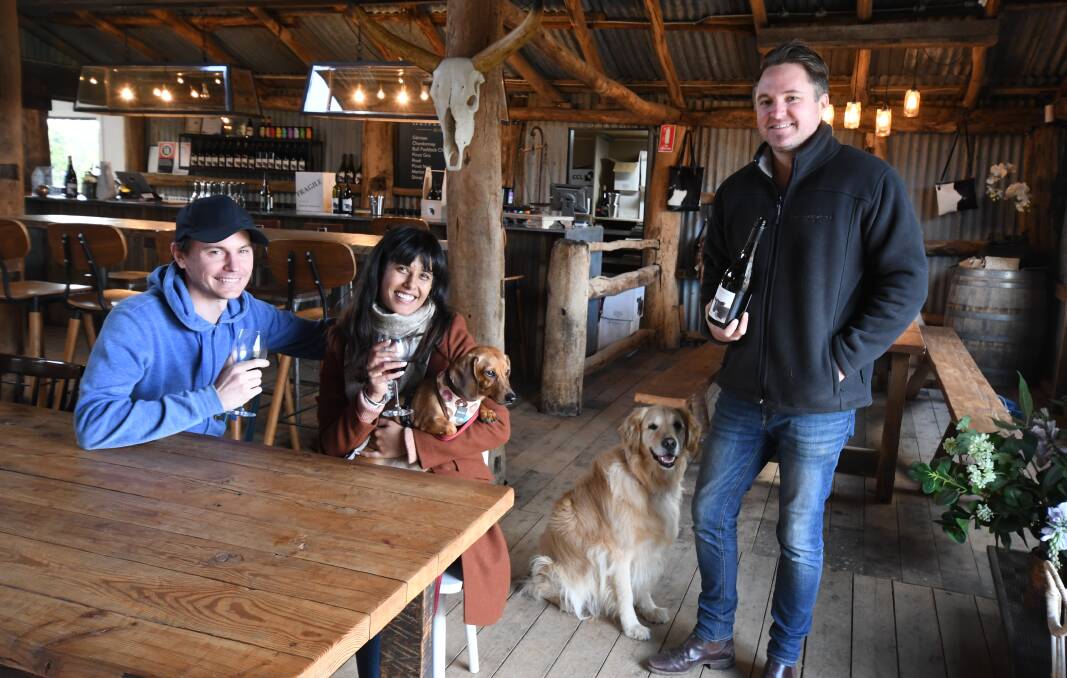 LOCAL HOSPITALITY: Sydney tourists Patrick Kearney, Surbhi Rikhi and Lucy with James Thomas and Uma at the Heifer Station winery. Photo: JUDE KEOGH 0612jkheifer3