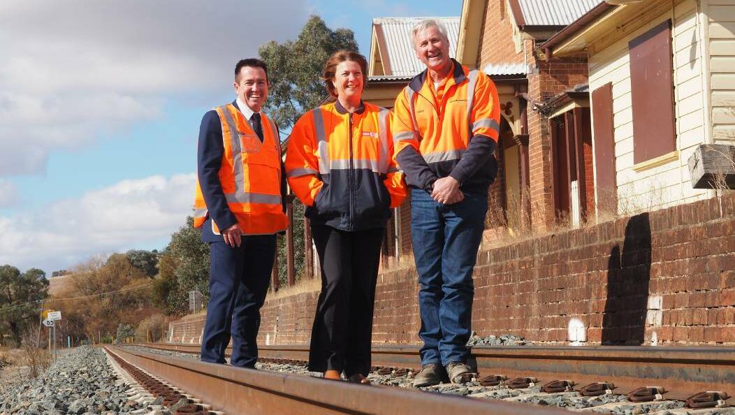 IMPROVEMENTS: Ministers Paul Toole and Melinda Pavey with transport operator Derek Larnach at Georges Plains station.