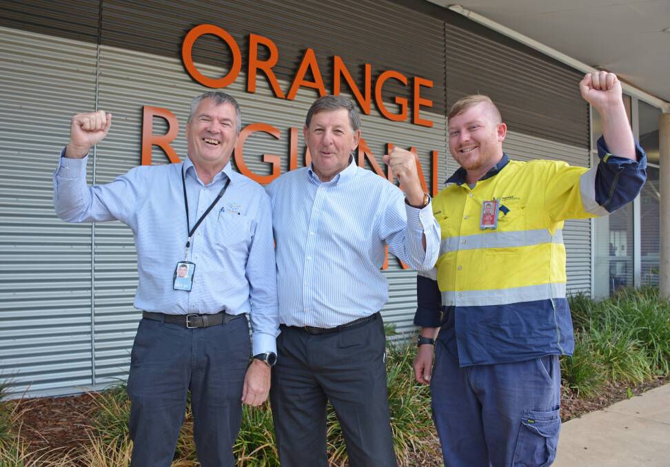 TAKE OFF: Airport and Emergency Services Manager Tim Mooney, Mayor Reg Kidd and Airport Reporting Officer Justin Bannon celebrate the announcement. Photo: SUPPLIED.