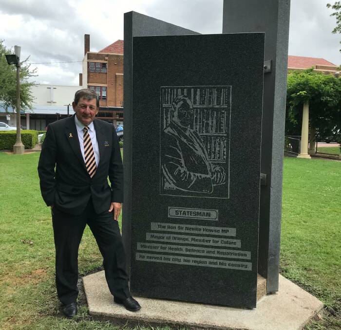 NEW HOME: Orange mayor Reg Kidd with the statue in Robertson Park. Photo: Supplied