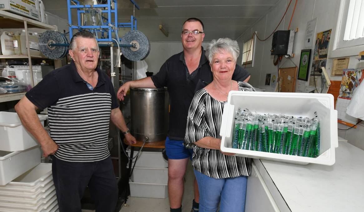 WATER ONLY: Dick, Glen and Marie Middleton have had to stop making milk ice blocks at their Hill Street base. Photo: JUDE KEOGH 1512jkmiddletons1