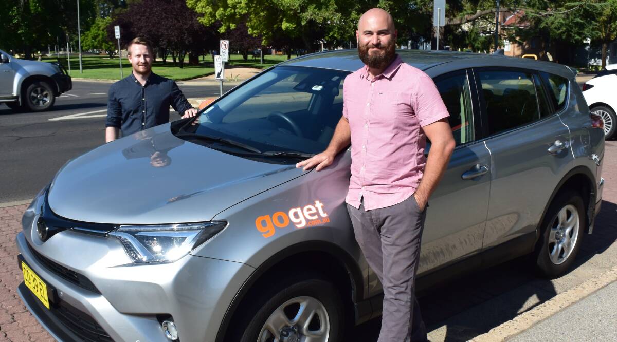 SUCCESS STORY: Jake Hyde and Chris Vanneste of car sharing firm GoGet which will expand to an eight car fleet in Orange. Photo: DAVID FITZSIMONS 0125dfgoget4