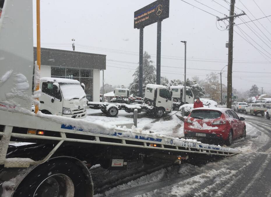 OBSTACLE: A car about to be towed away on Forbes Road. Photo: JUDE KEOGH