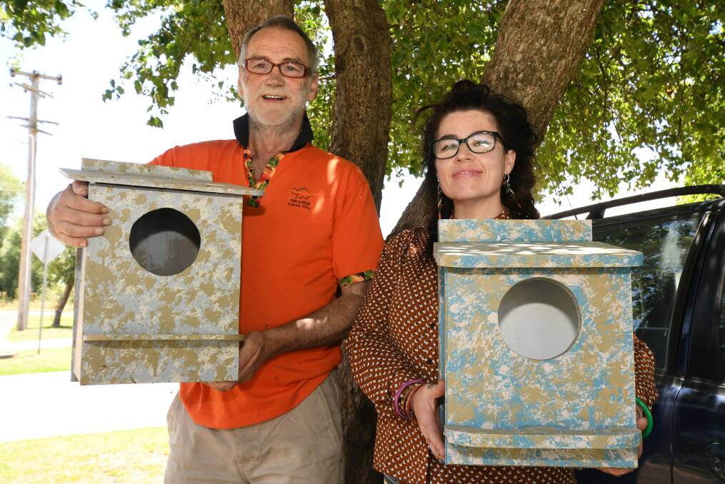 NEW HOMES: Tony Callaghan and Queenie Green with possum boxes he has made and donated to WIRES. Photo: JUDE KEOGH 0122jkpossum1