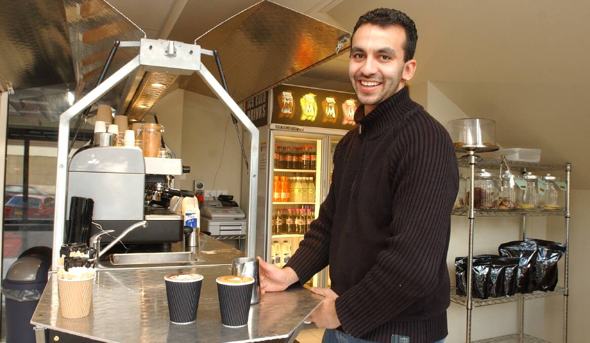 BACK THEN: Kane Bodiam makes a coffee at his Byng Street Palazzo Ristretto Cafe Bar in 2008. Photo: JUDE KEOGH 0630barista2