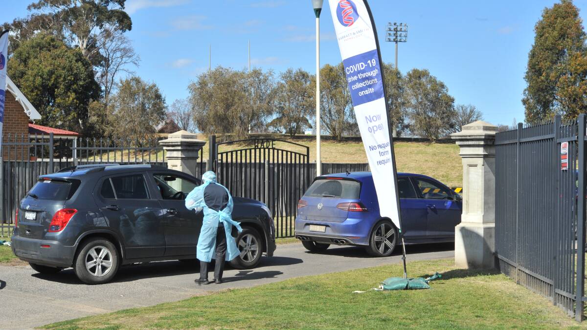 GET TESTED: People in the line at Wade Park awaiting COVID tests. Photo: CARLA FREEDMAN